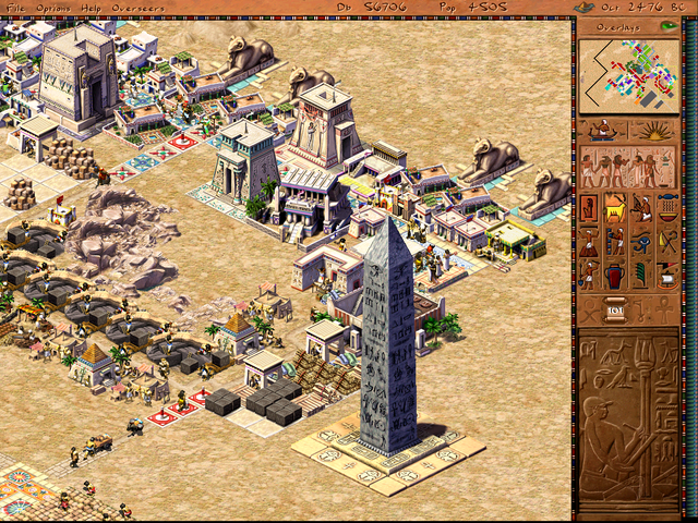 Picture showing an well developed settlement and an obelisk construced out of granite